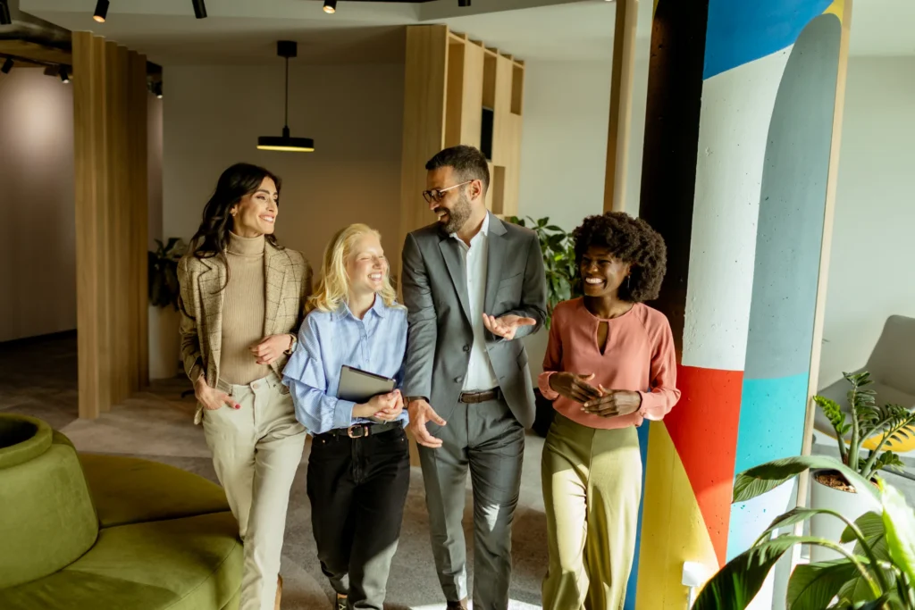 collaborative team walks through the modern office 2026 03 19 07 04 37 utc