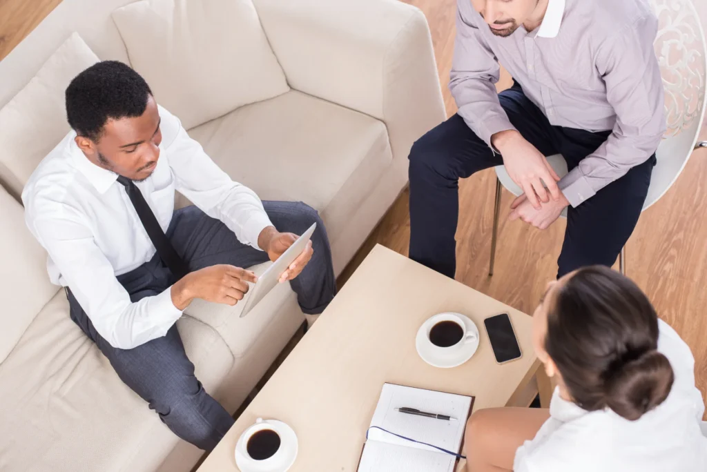top view three business people are sitting table